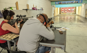 Precision shooting session focusing on firearm safety and handling