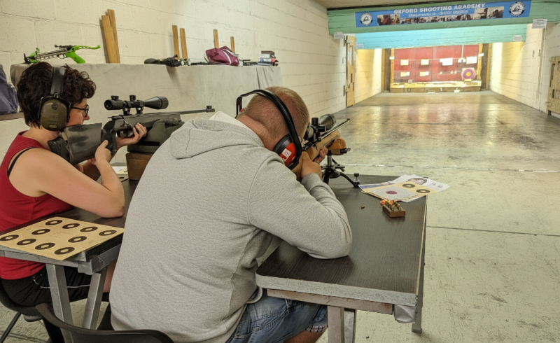 Precision shooting session focusing on firearm safety and handling