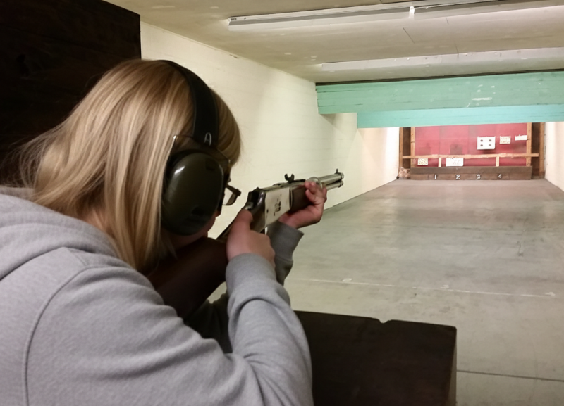Precision shooting session focusing on firearm safety and handling